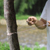 Military-grade outdoor travel survival kit with mini camping tools, emergency bracelet, whistle, blanket and knife.